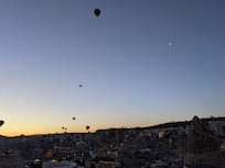 View of the balloons at sunrise from our room 👌