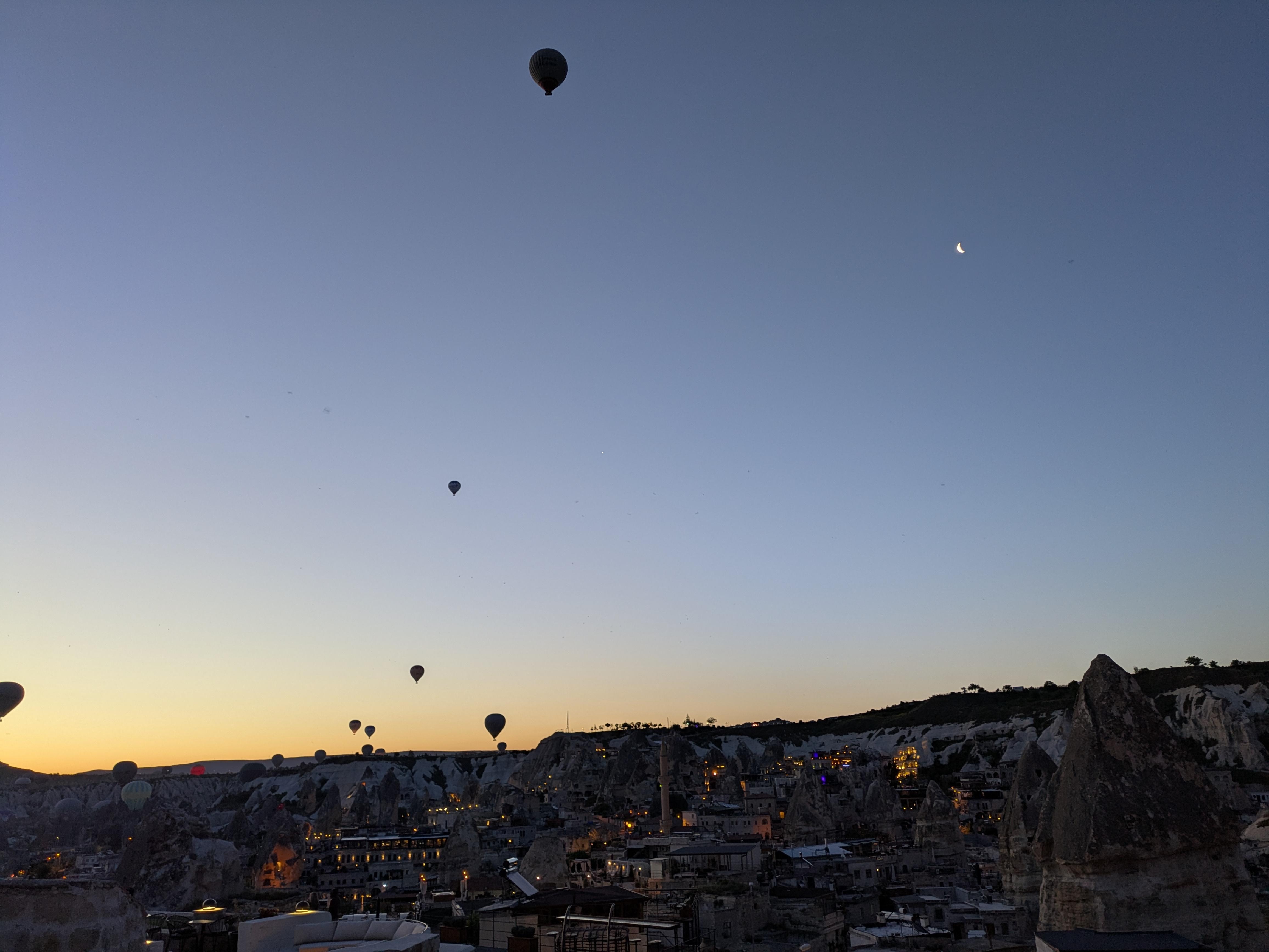 View of the balloons at sunrise from our room 👌