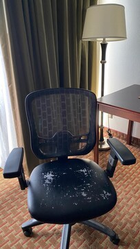 Peeling chair. Can't see stains on lampshade.