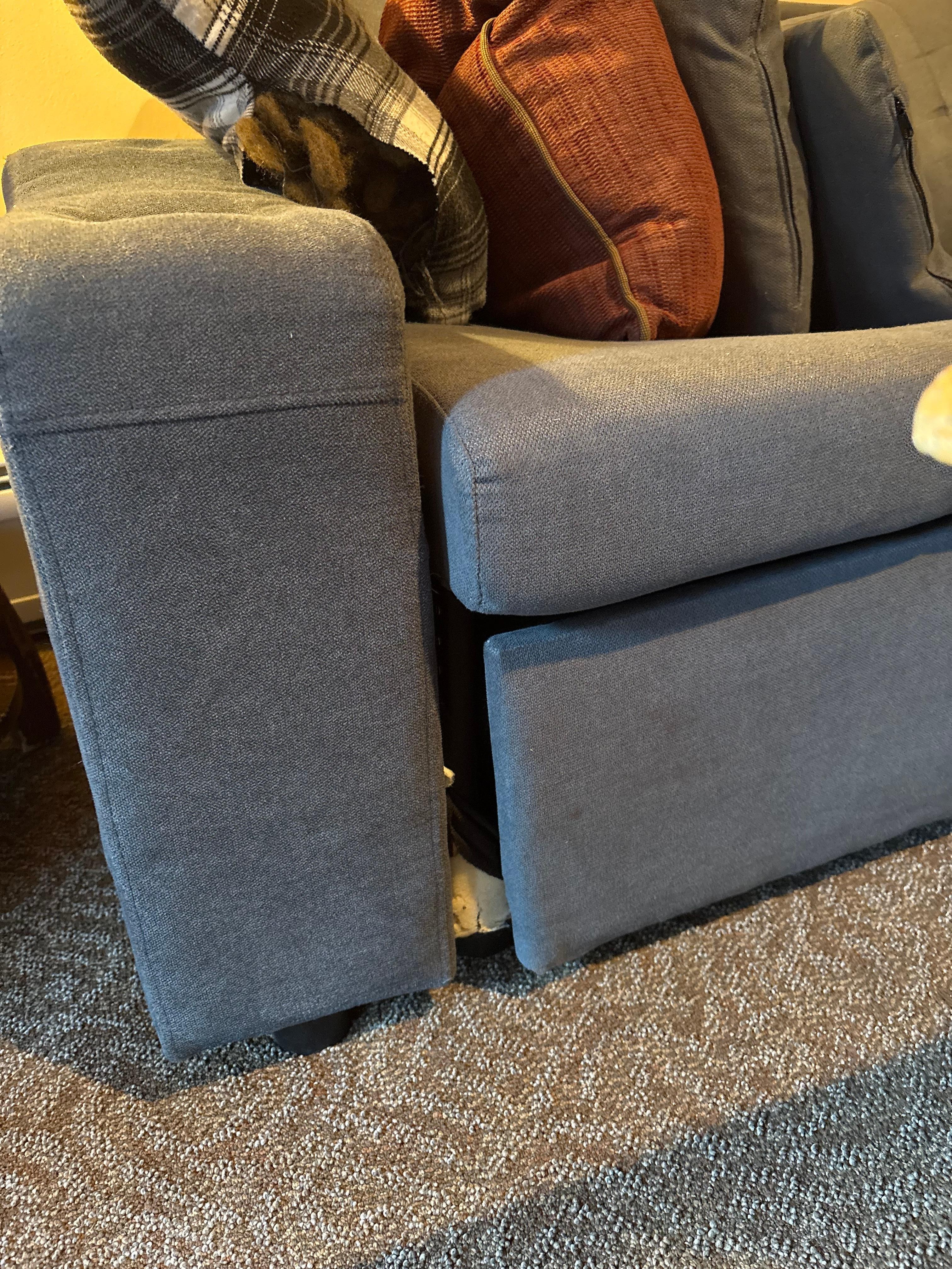 Broken sofa. You can see the pieces were just kind of pushed together. 