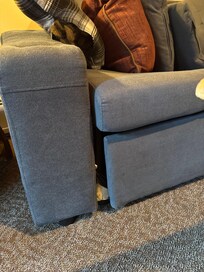Broken sofa. You can see the pieces were just kind of pushed together.