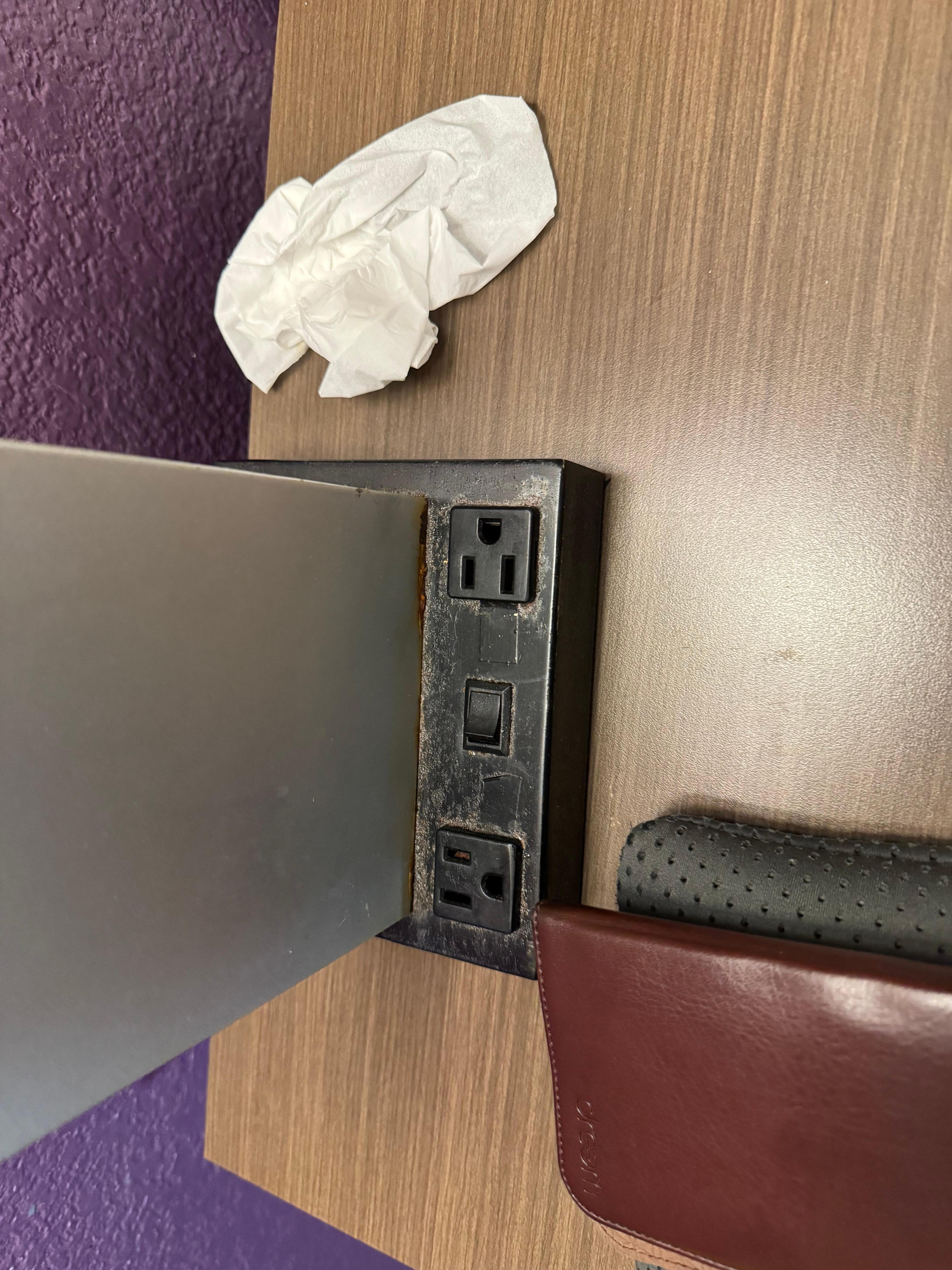 Corroded and dirty nightstand power outlets