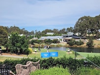 Amazing backyard with the decking area over looking the 8th hole.