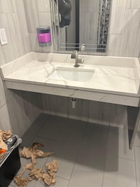 Lobby bathroom at ten am.