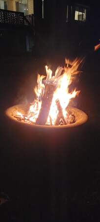 A nice fire to sit around during the cool nights.