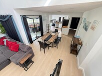 Open space dining room connecting to living space.