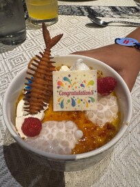 Celebrating my Son’s recovery from Leukemia at the restaurant the staff was so amazing they brought his this with a balloon!
