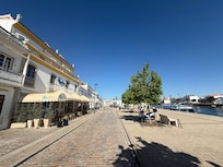 Front of hotel on promenade (ferry launch on right…20 steps away).