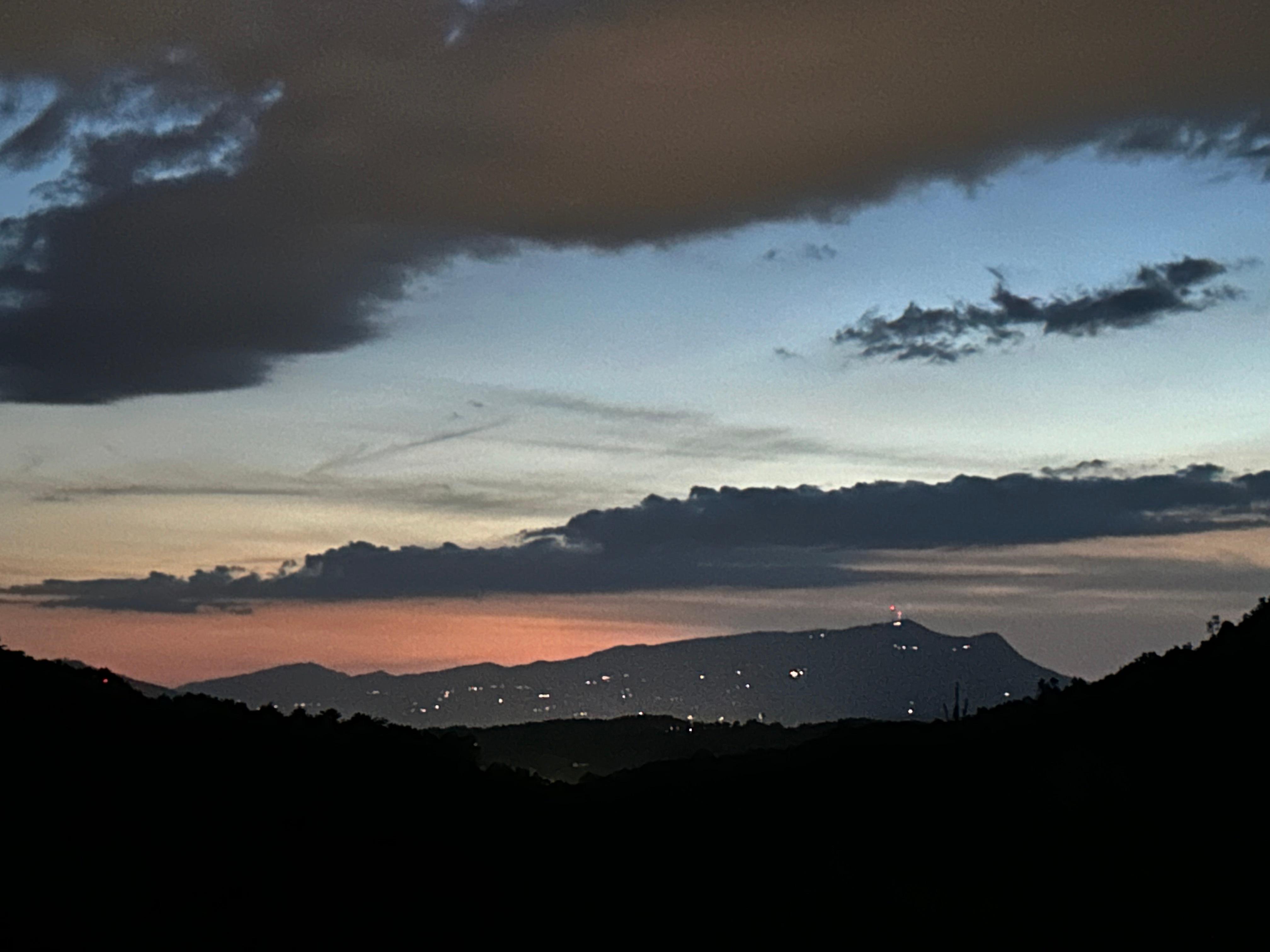 Can you see the twinkling lights on the mountain?
