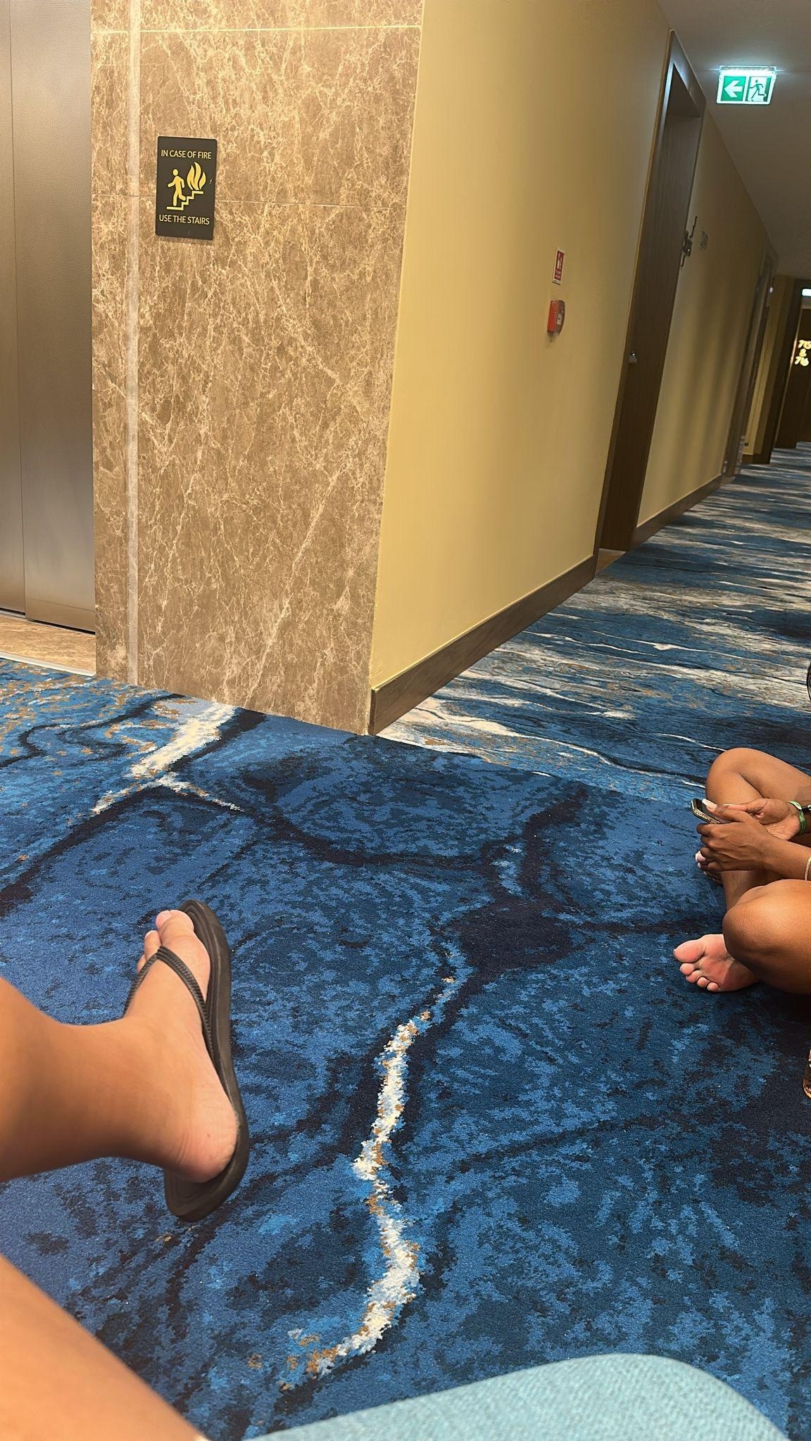 Sat out on the floor waiting for someone to come and open our room.