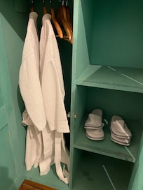 Amenities in each room include bathrodes and slippers