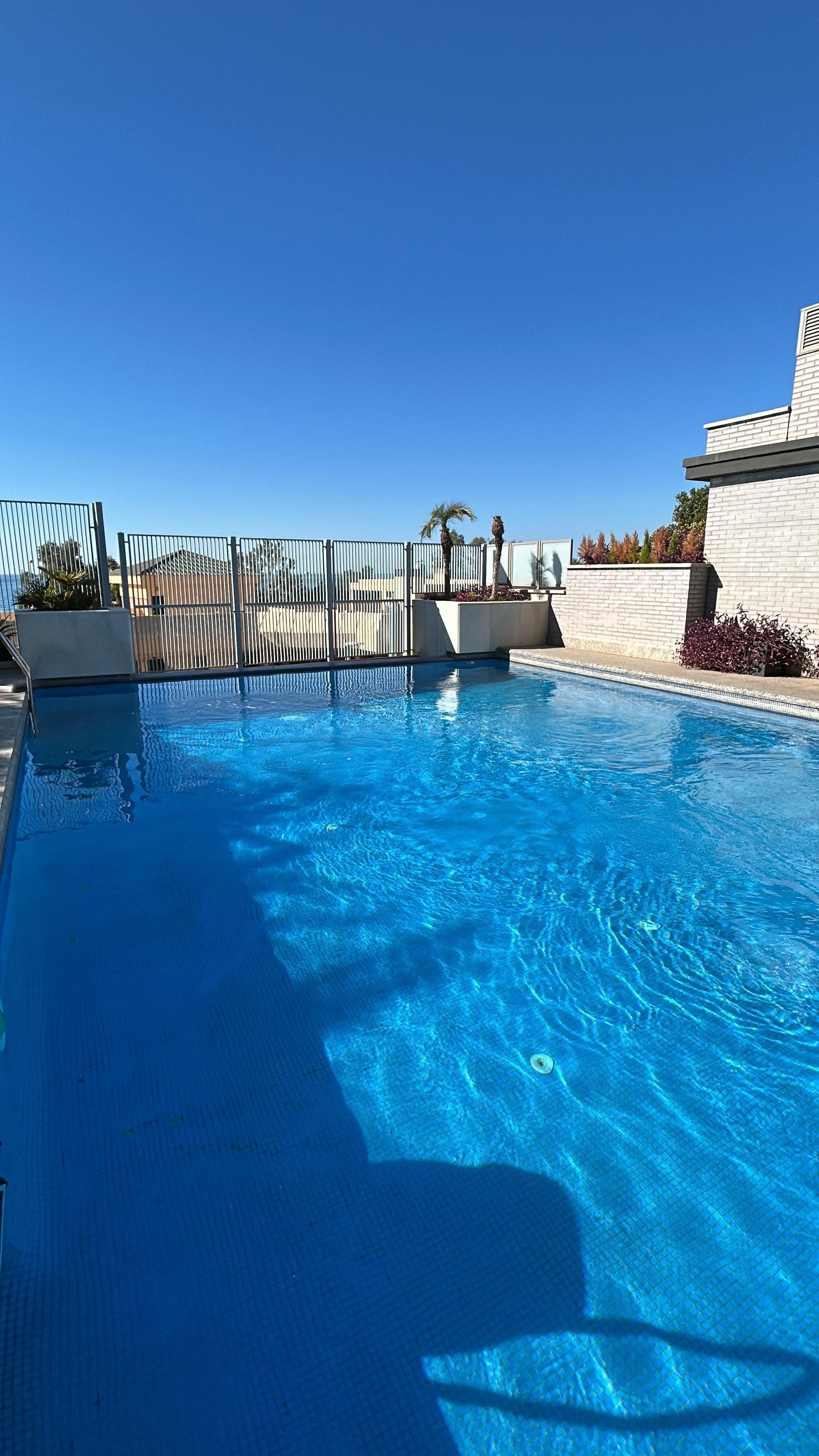 A rooftop pool with clean and warm water