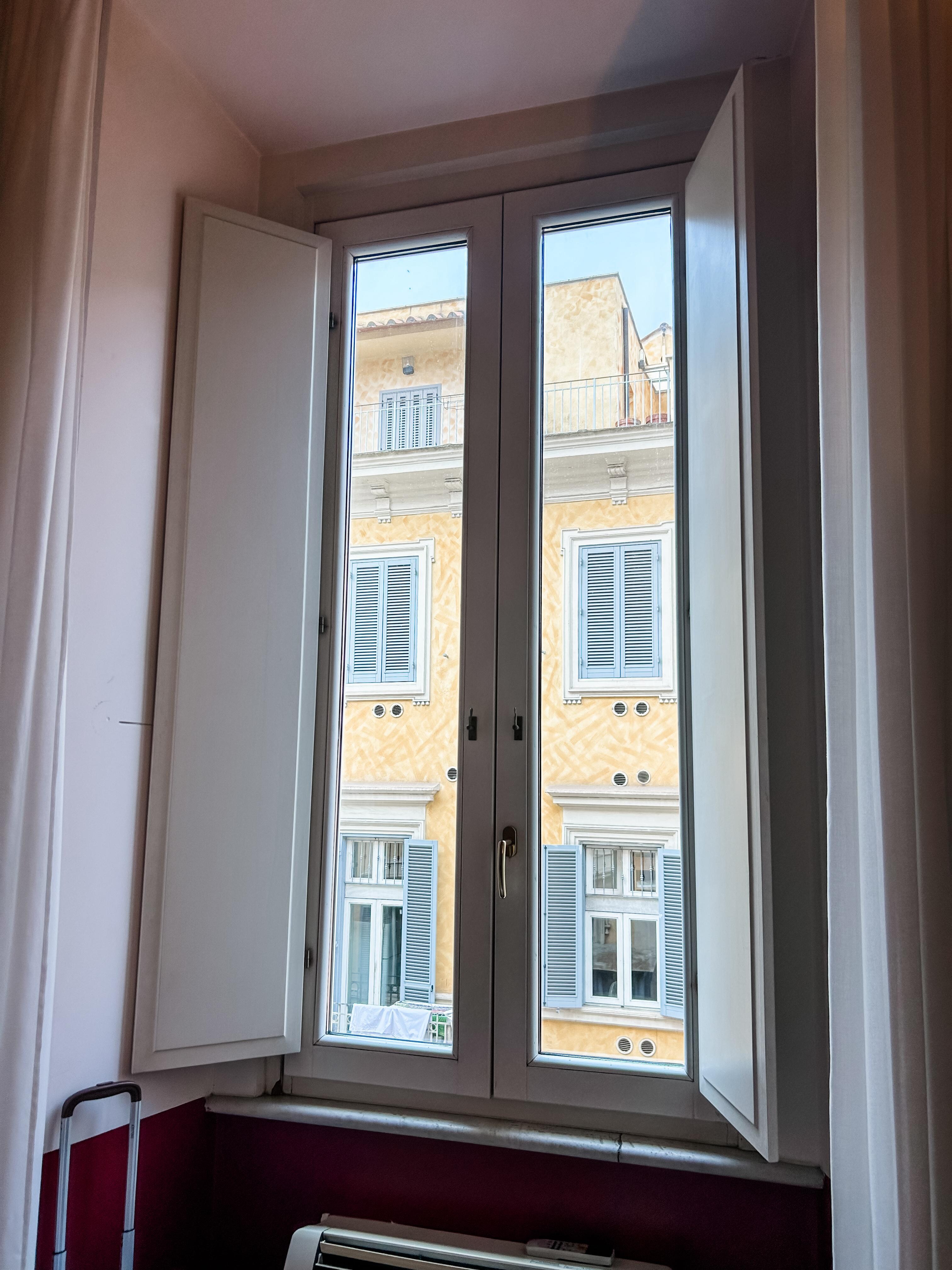 Window overlooking a busy street. We could not hear any street noise.