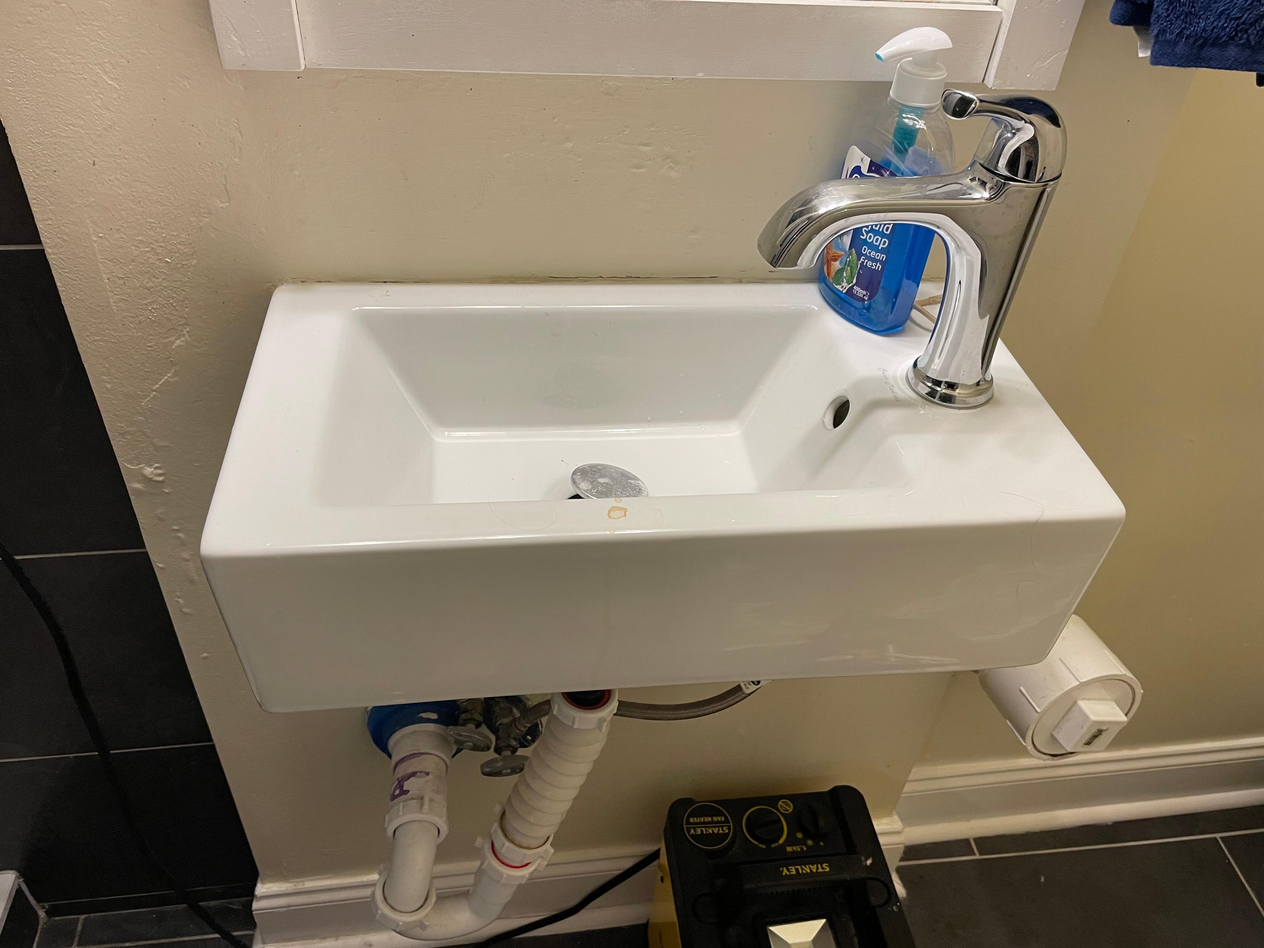 tiny sink in bathroom