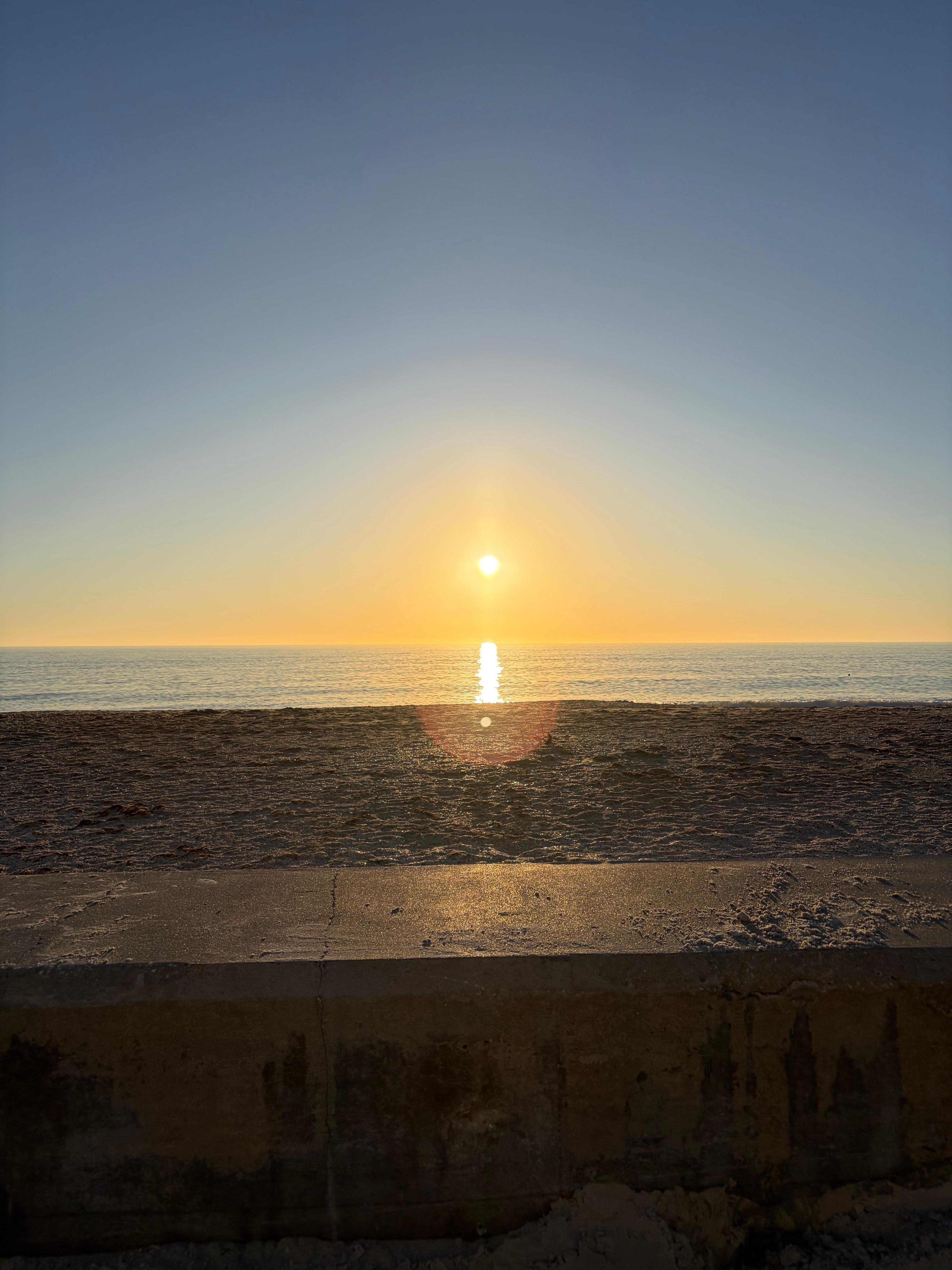 Sunset over the gulf from the beach