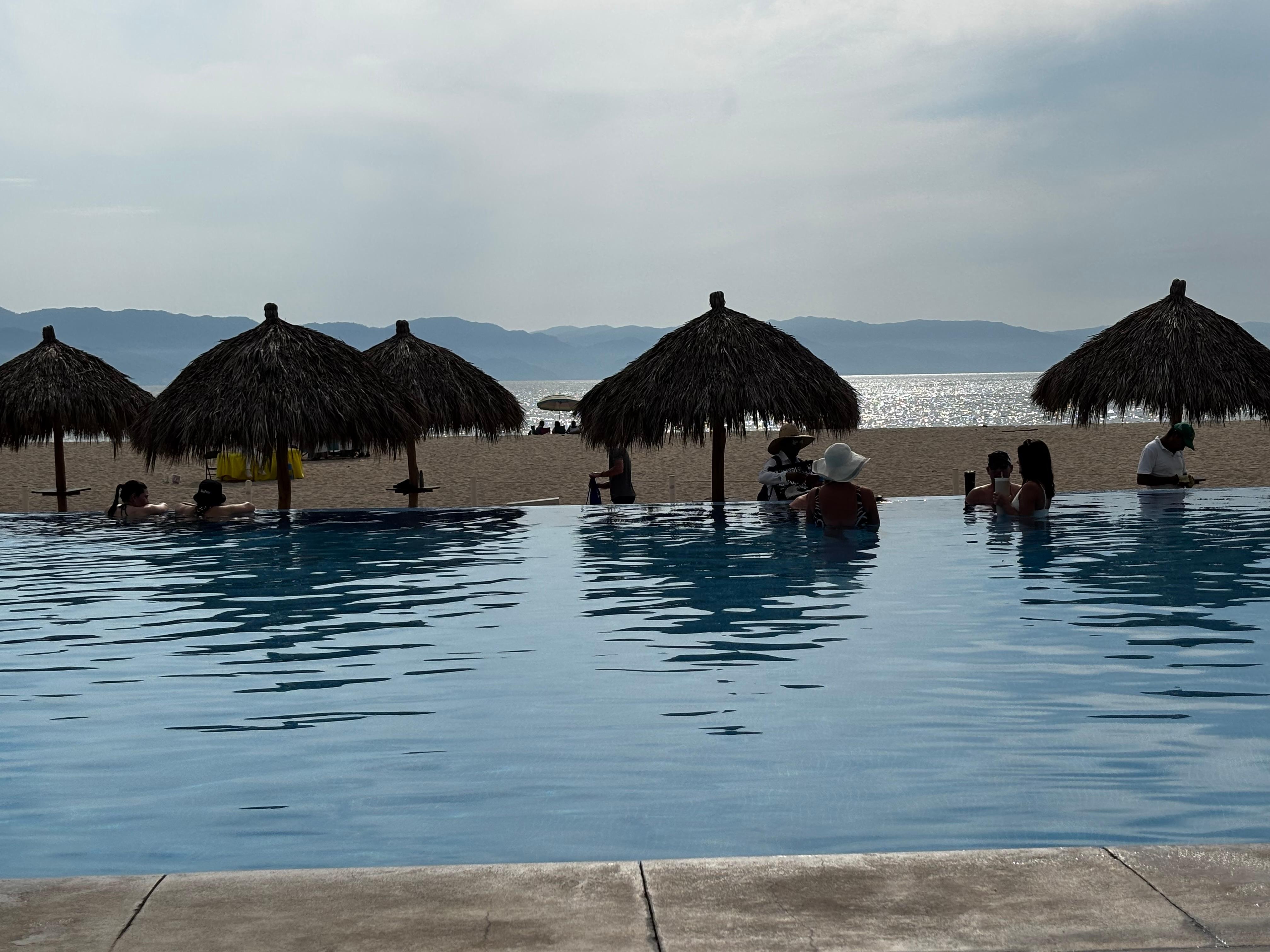 A view from our lounge chairs at one of 4 pools!