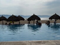 A view from our lounge chairs at one of 4 pools!