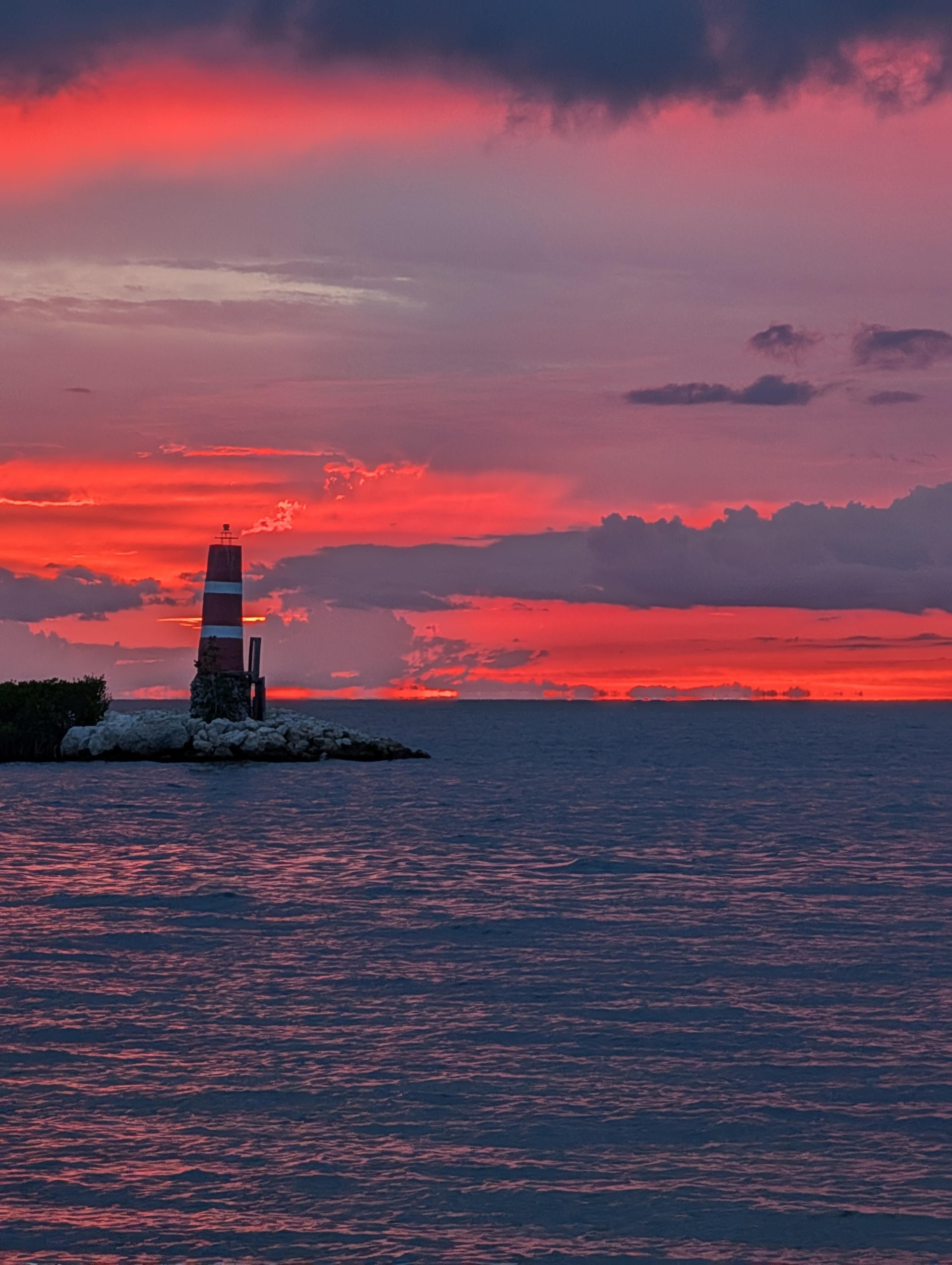 Sitting on the beach watching the sunset.
