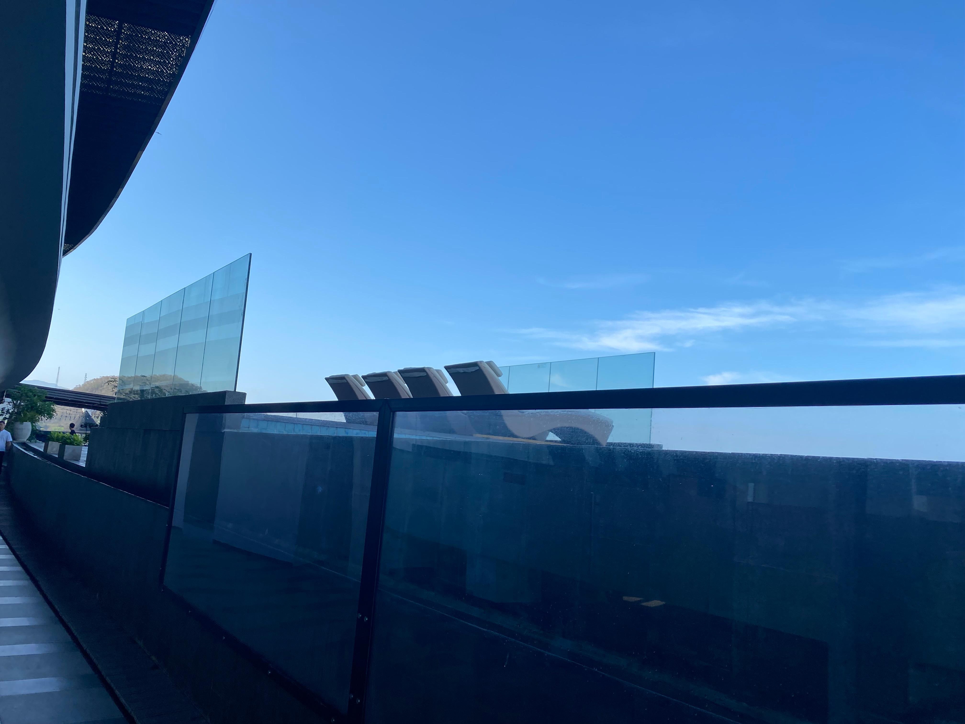 The total number of pool chairs. Notice no shade.