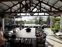 View from the pool at night back at the living space