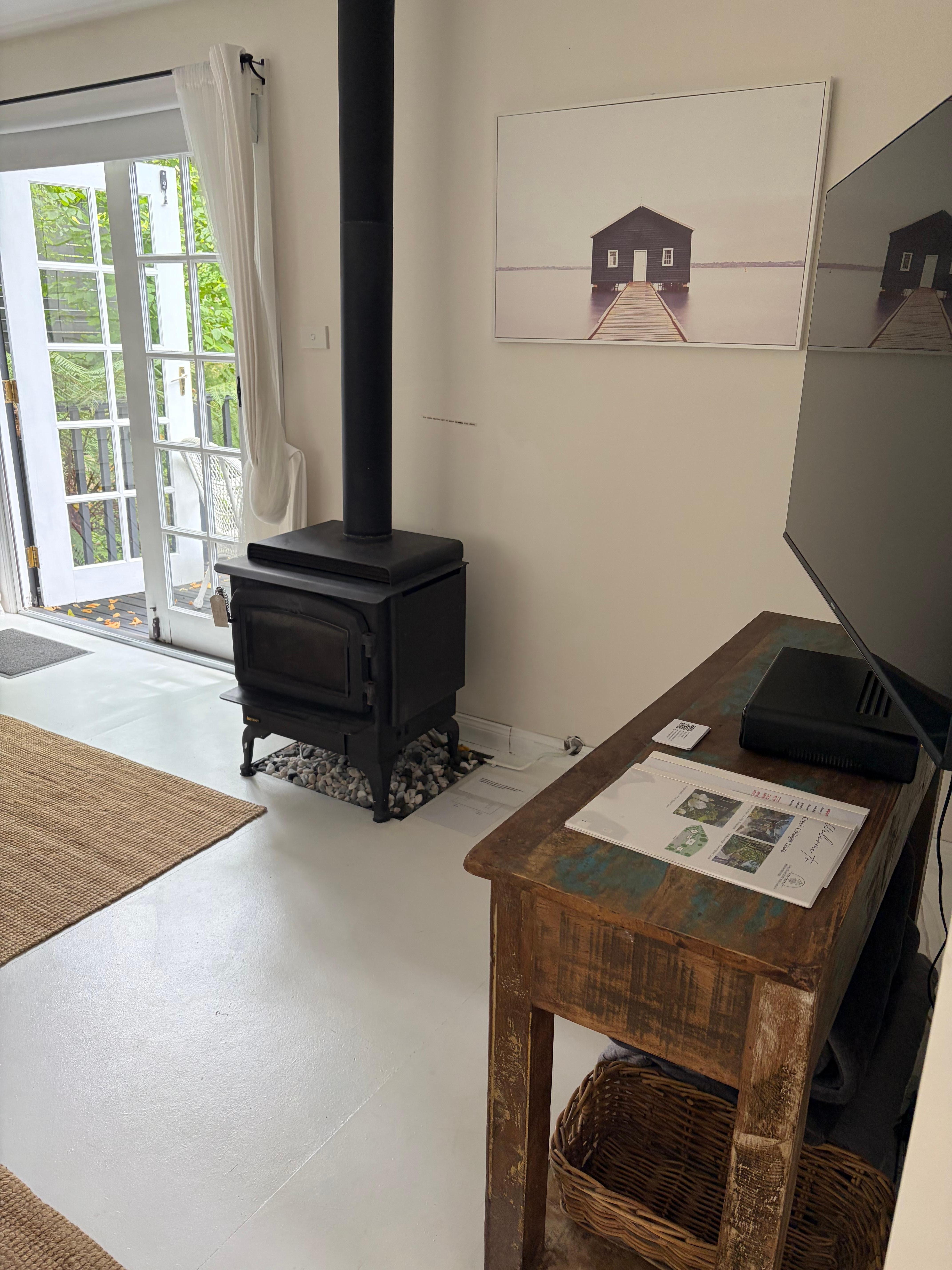 Doors open to garden and deck