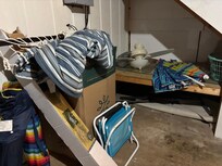 The hammock pictured in photos laying broken in a pile of stuff