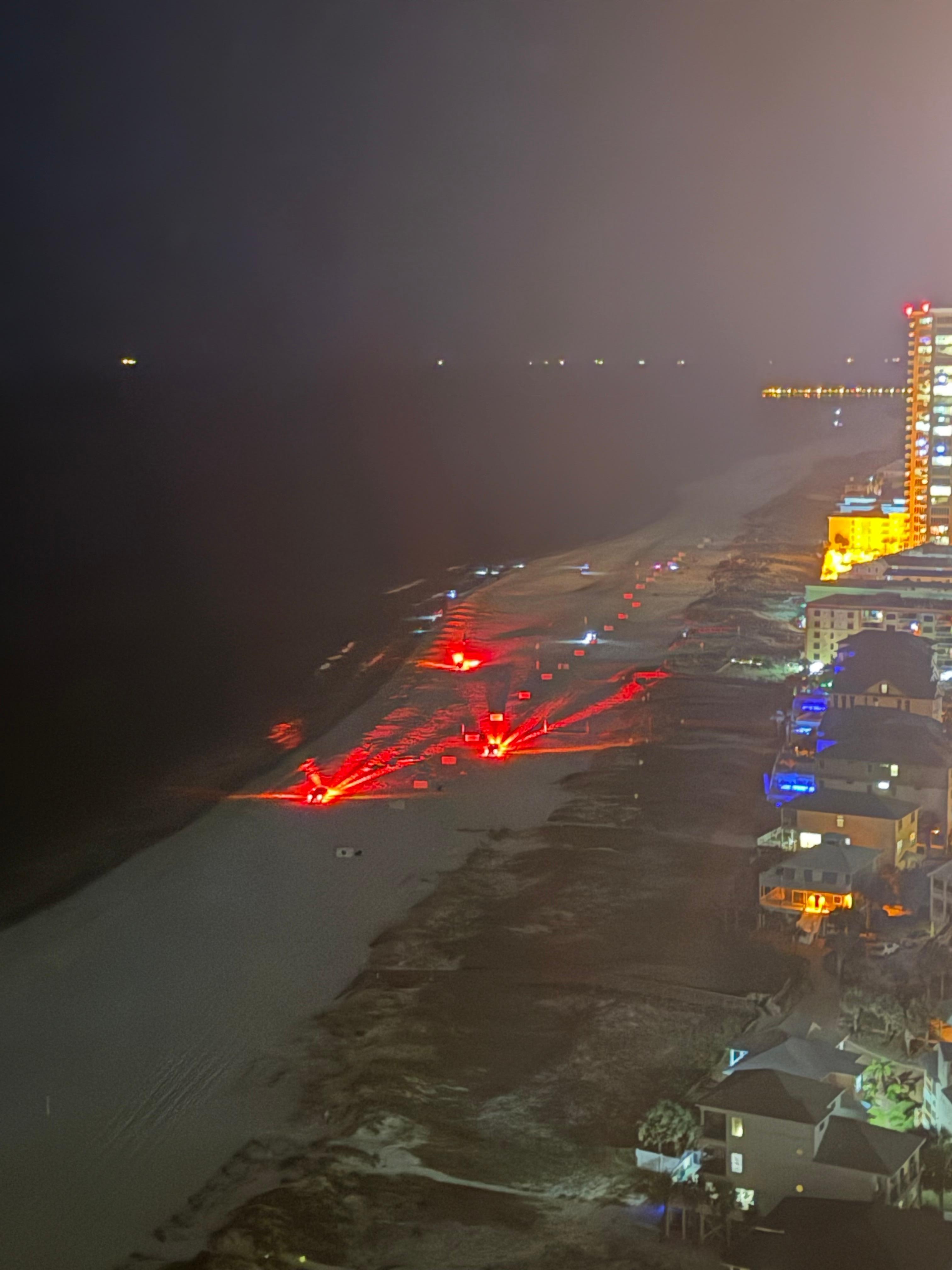View cleaning the beach at night