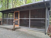 Enclosed porch with hot tub!