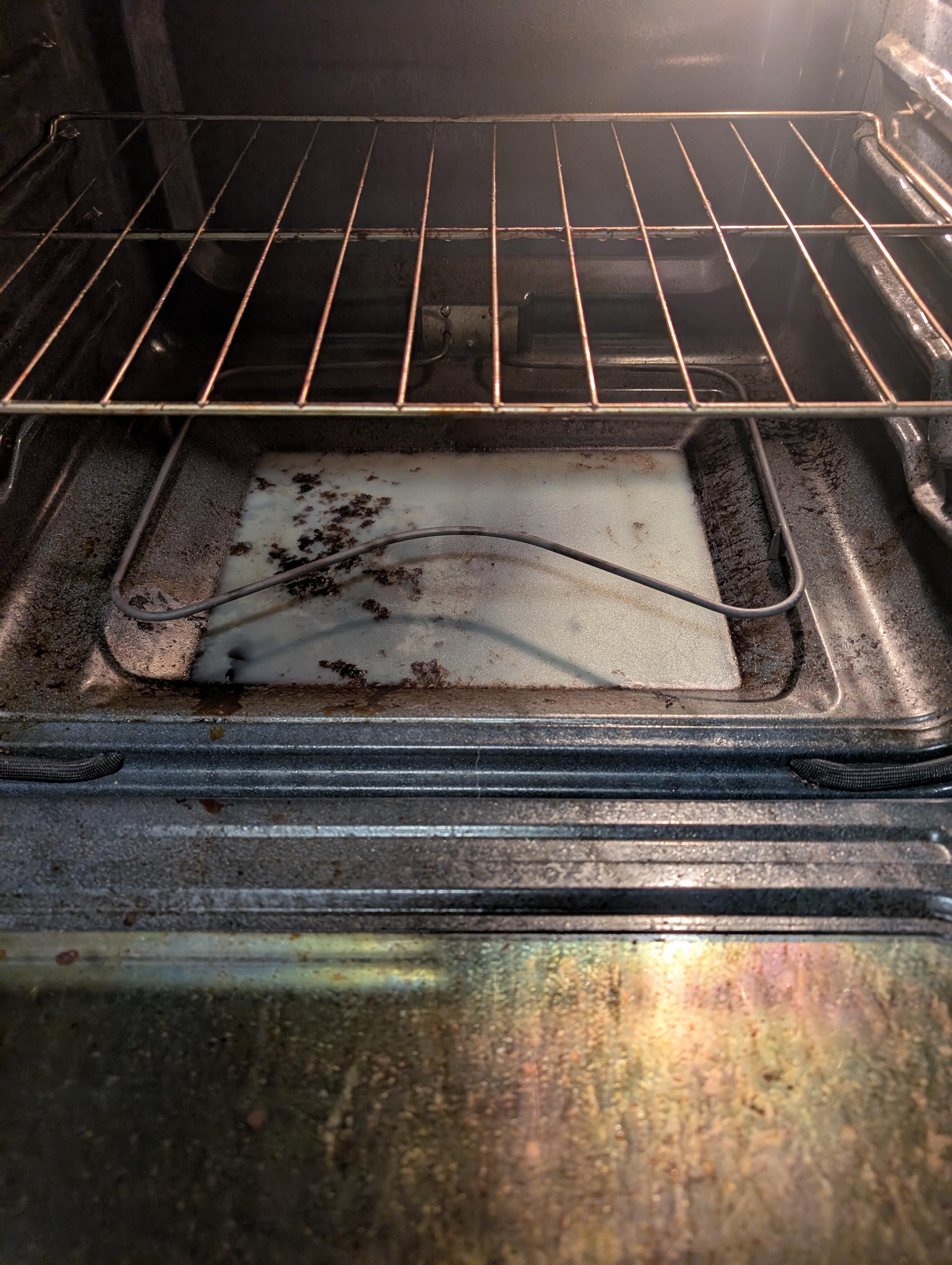 That is grease in the bottom of the oven. We did not see a fire extinguisher!! 