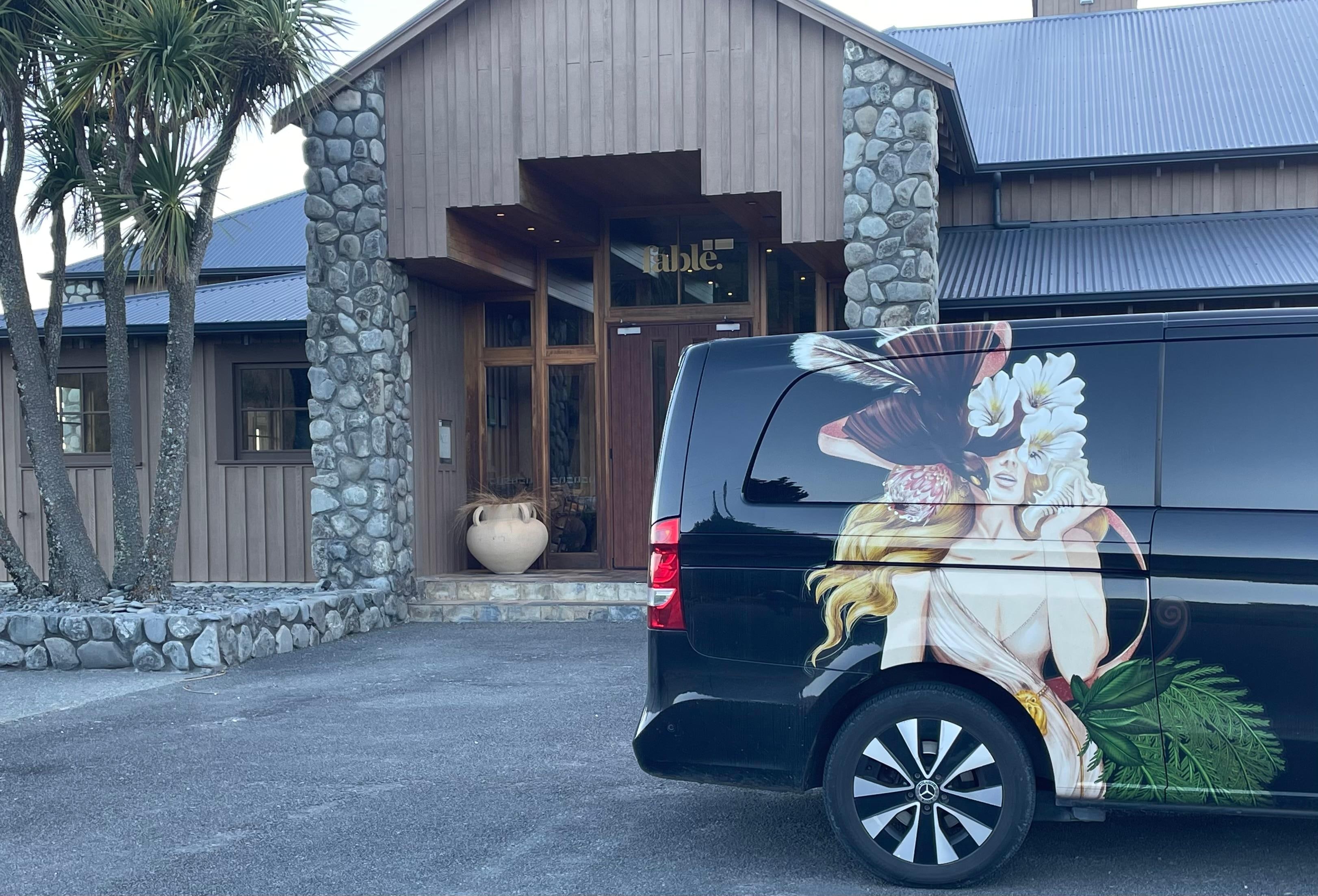 Entrance and their courtesy van.