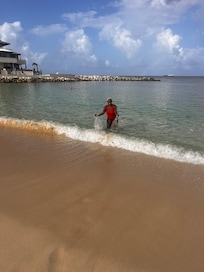 Enjoying the beach outside our hotel room