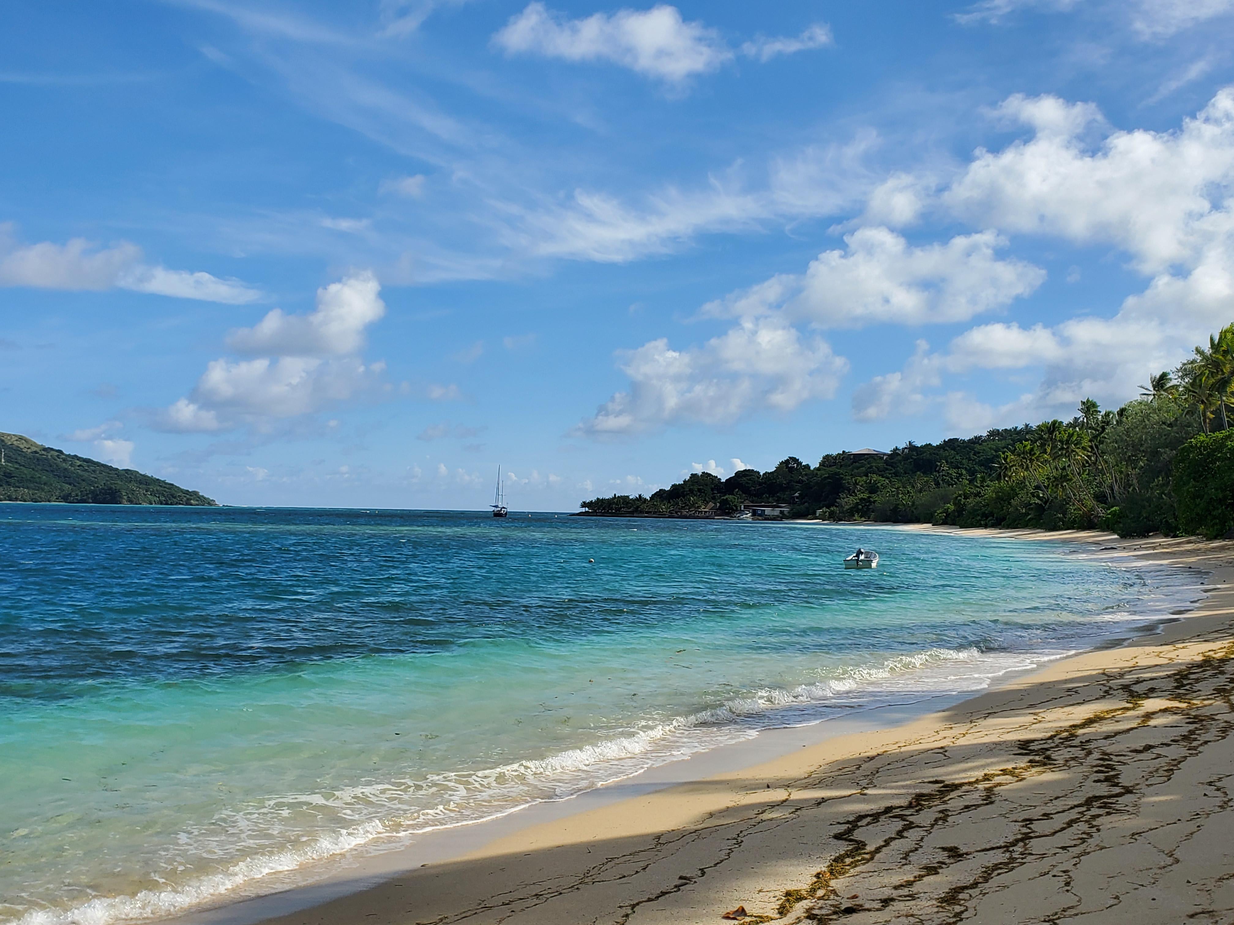 Looking north along Blue Lagoon beach, the resort is on the point.