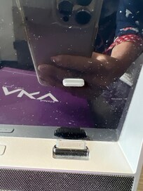 Outdated iPod speakers in rooms.