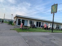 The rooms by the pub. Too close to sleep.