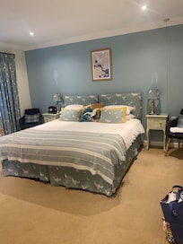 Bedroom, with large bed. On the ground floor of the courtyard bedrooms.