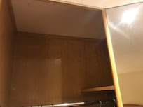 Cobwebs in wardrobe.