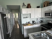 Full kitchen is super clean.