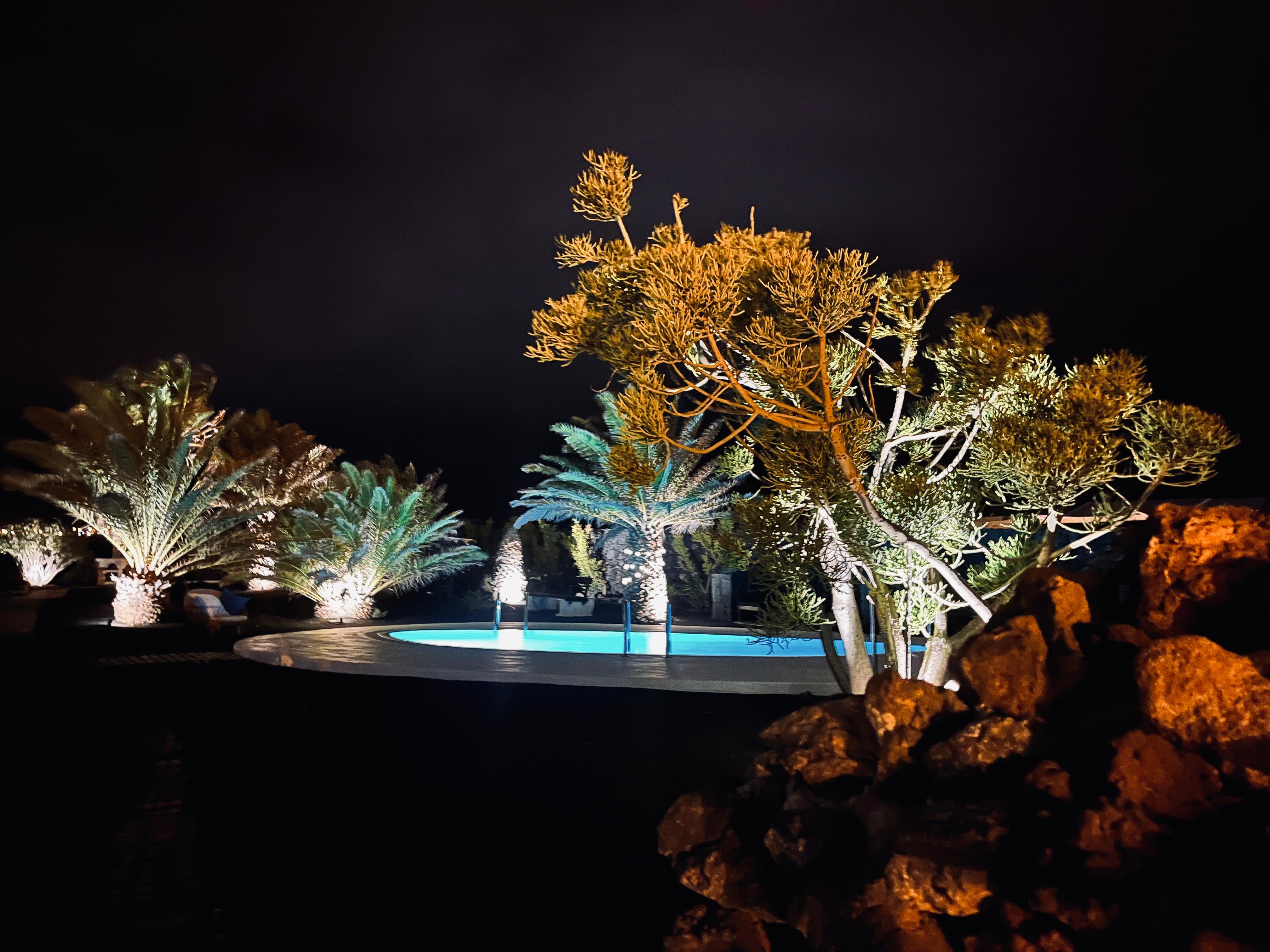 The pool area at night 