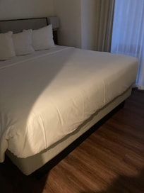 Possible for 2 adults and 1 child to sleep in this large bed