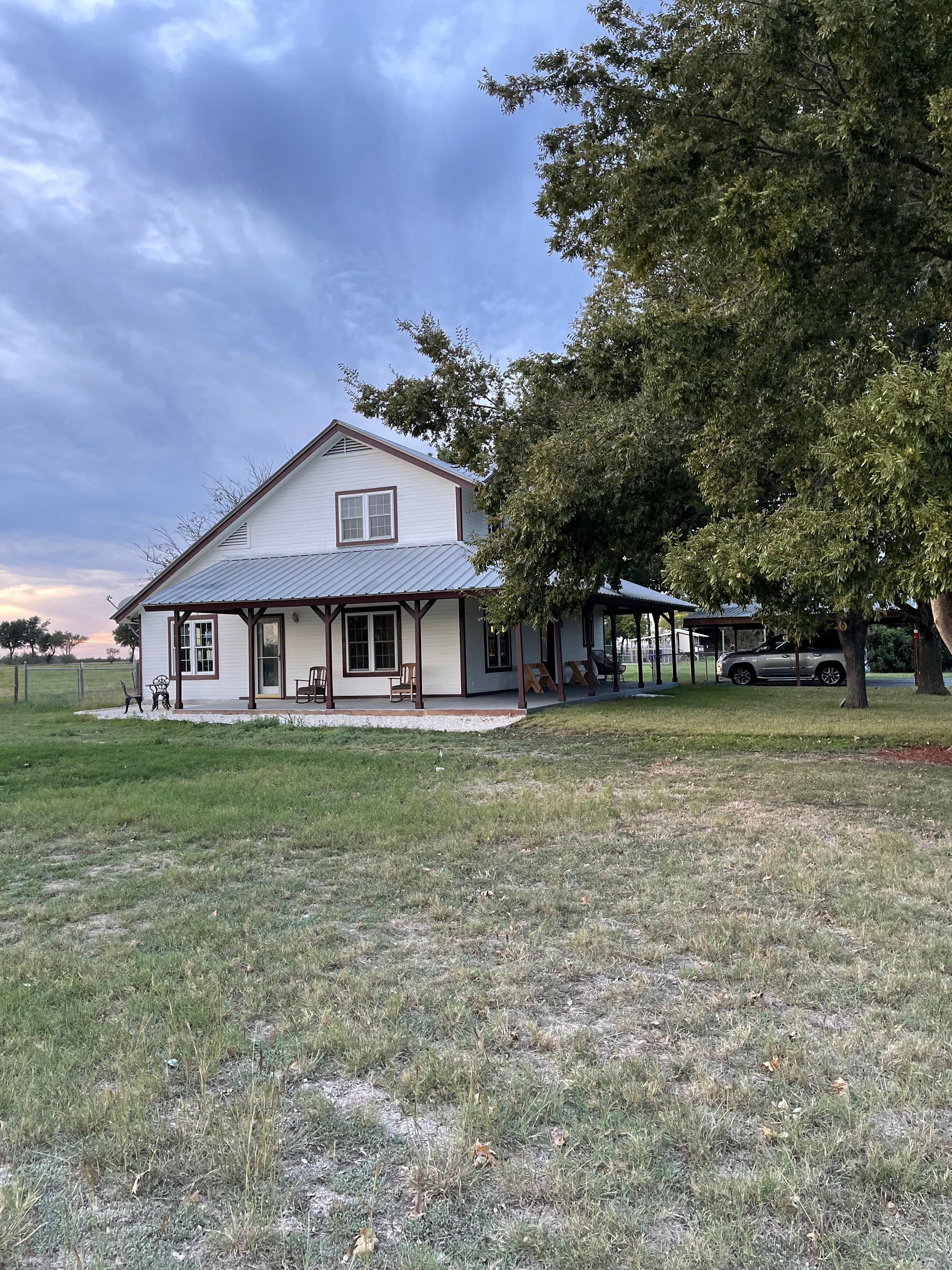 Side view of house and property.