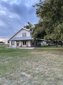 Side view of house and property.
