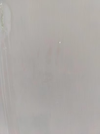 Hand print next to suspicious stain