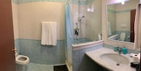 Spacious but spartan. Shower curtain needs a replacement.
