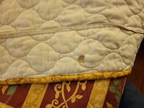 Another cigarette burn hole in back of bedspread. Noticed at least 10 on the bed cover.
