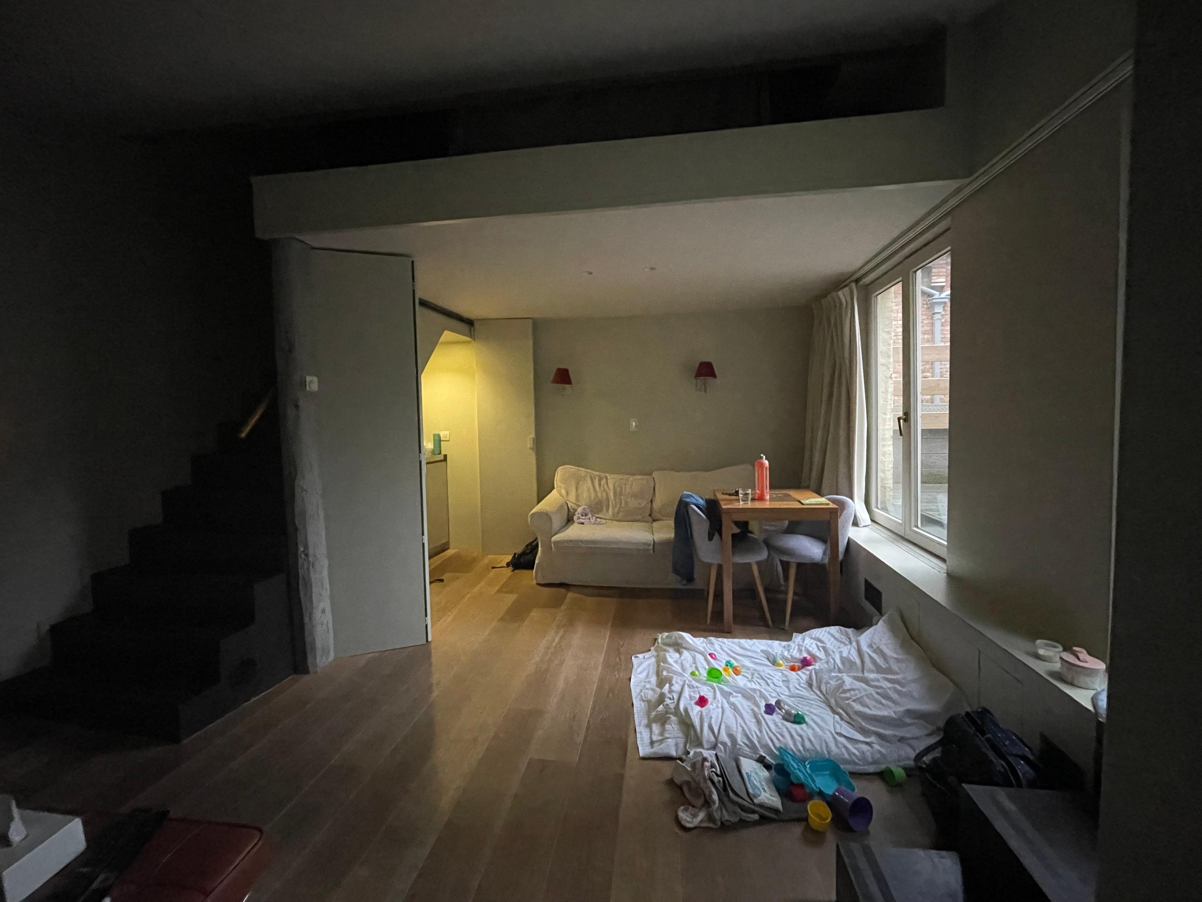 View from bathroom with stairs up to mezzanine