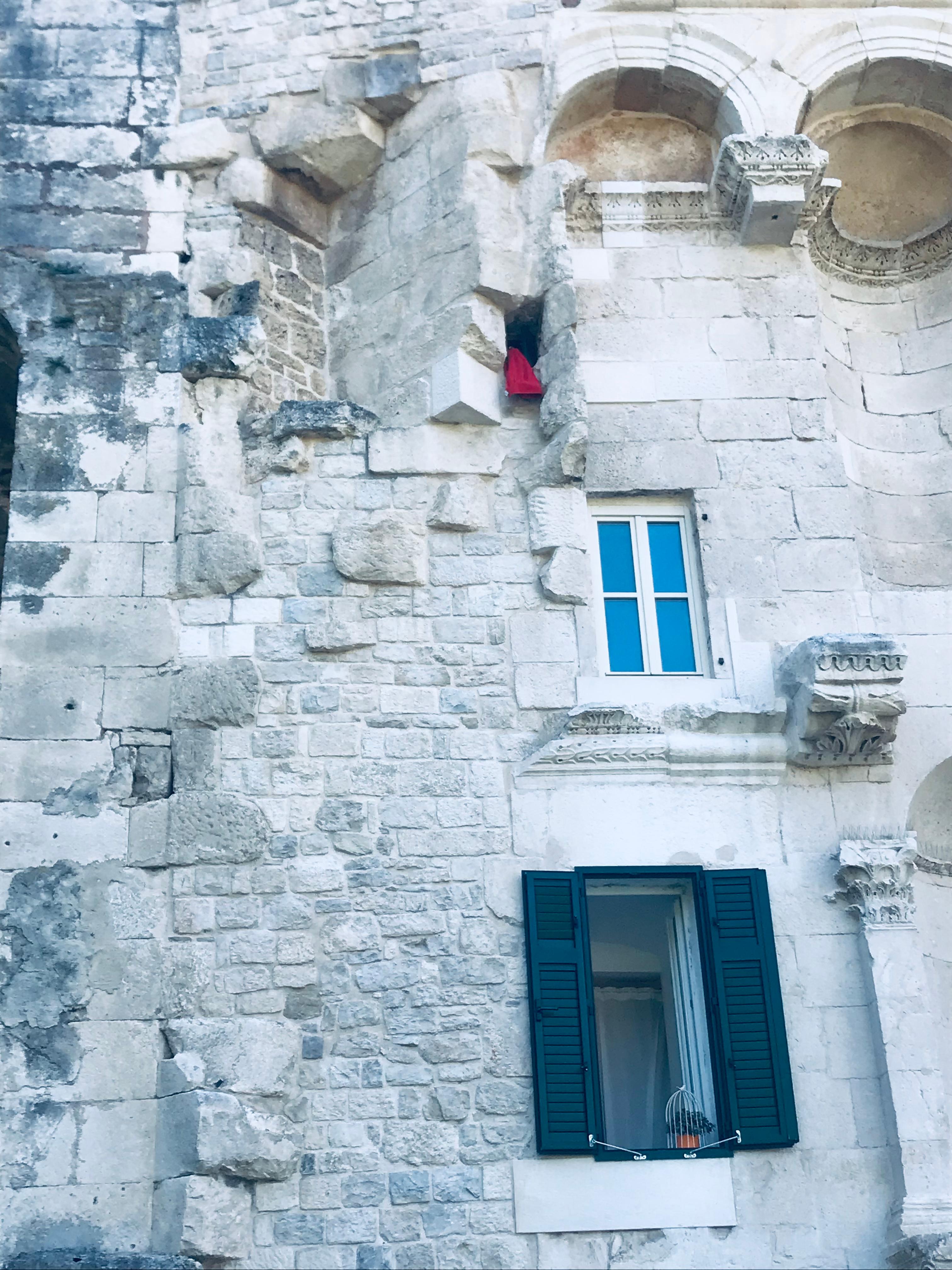 A red shirt marks one of the unit’s windows.