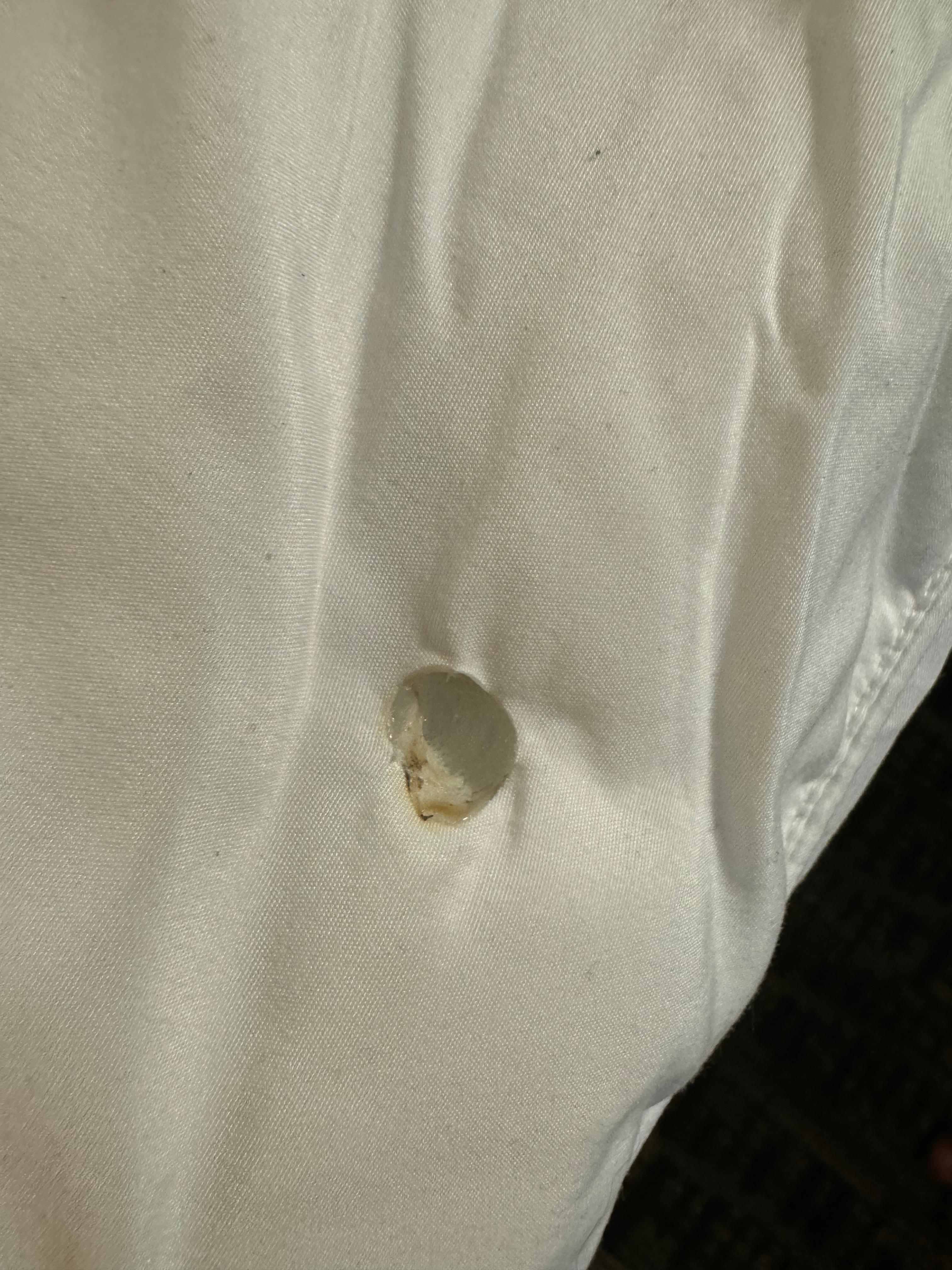 Cigarette burn in bedding