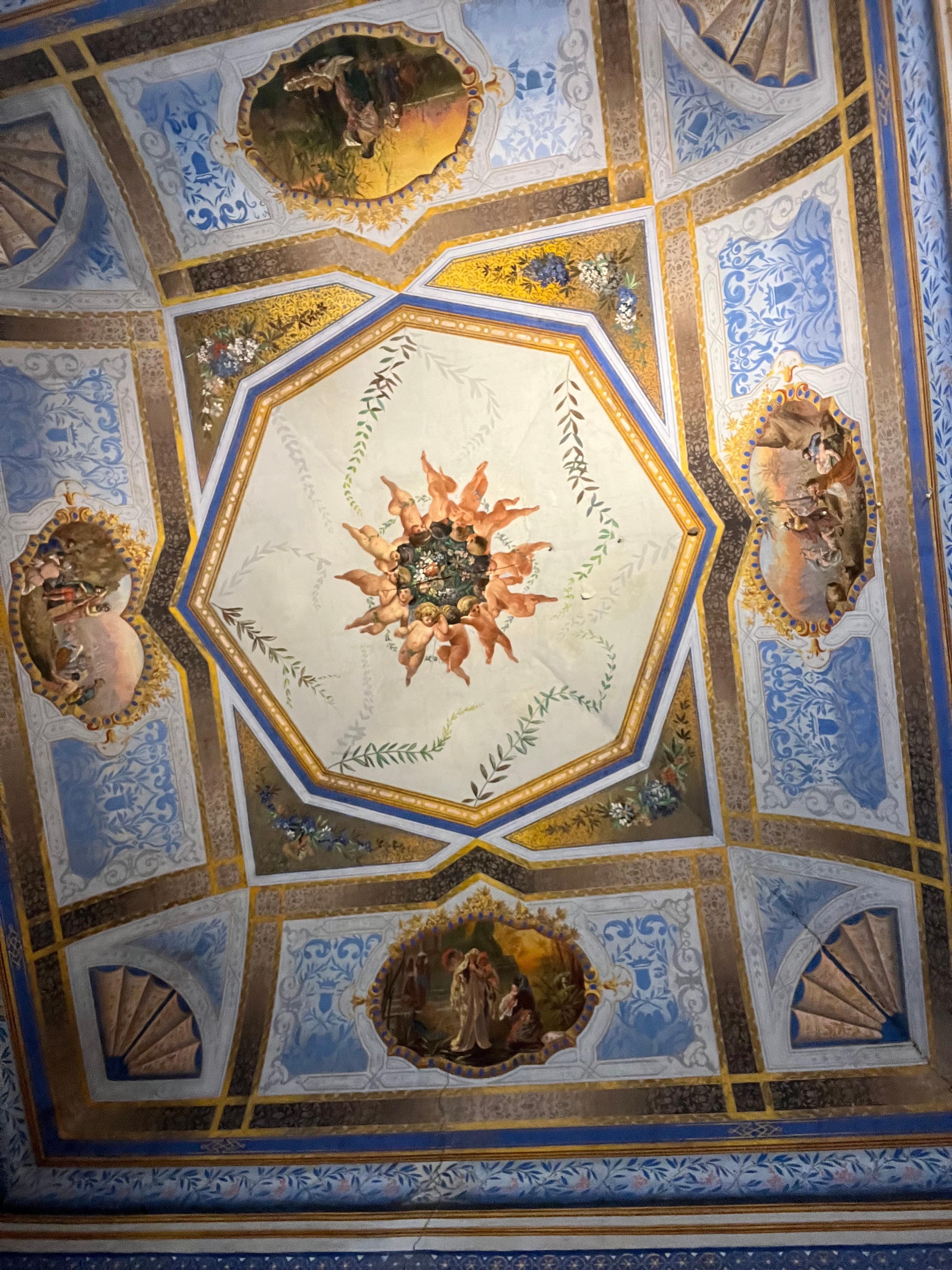 Ceiling above the bed.