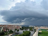 Rare thunderstorm approaching moon bar