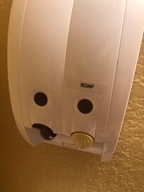 Soap dispenser on the sink